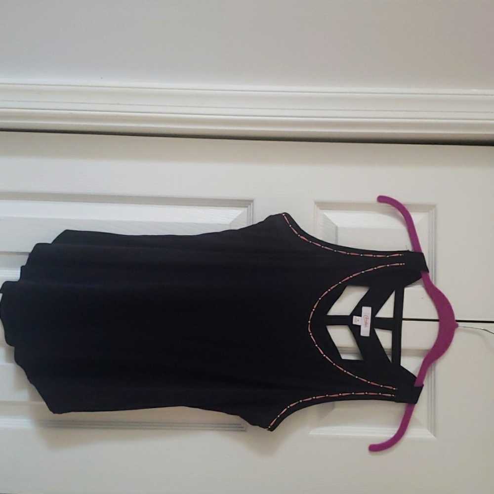 Black tank top with lattice back and pink embroidered trim on neck line